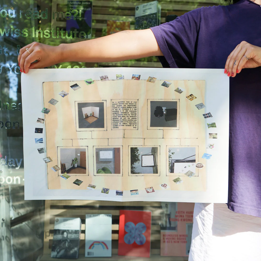 Photo of a newspaper held up in front of the swiss institute in nyc